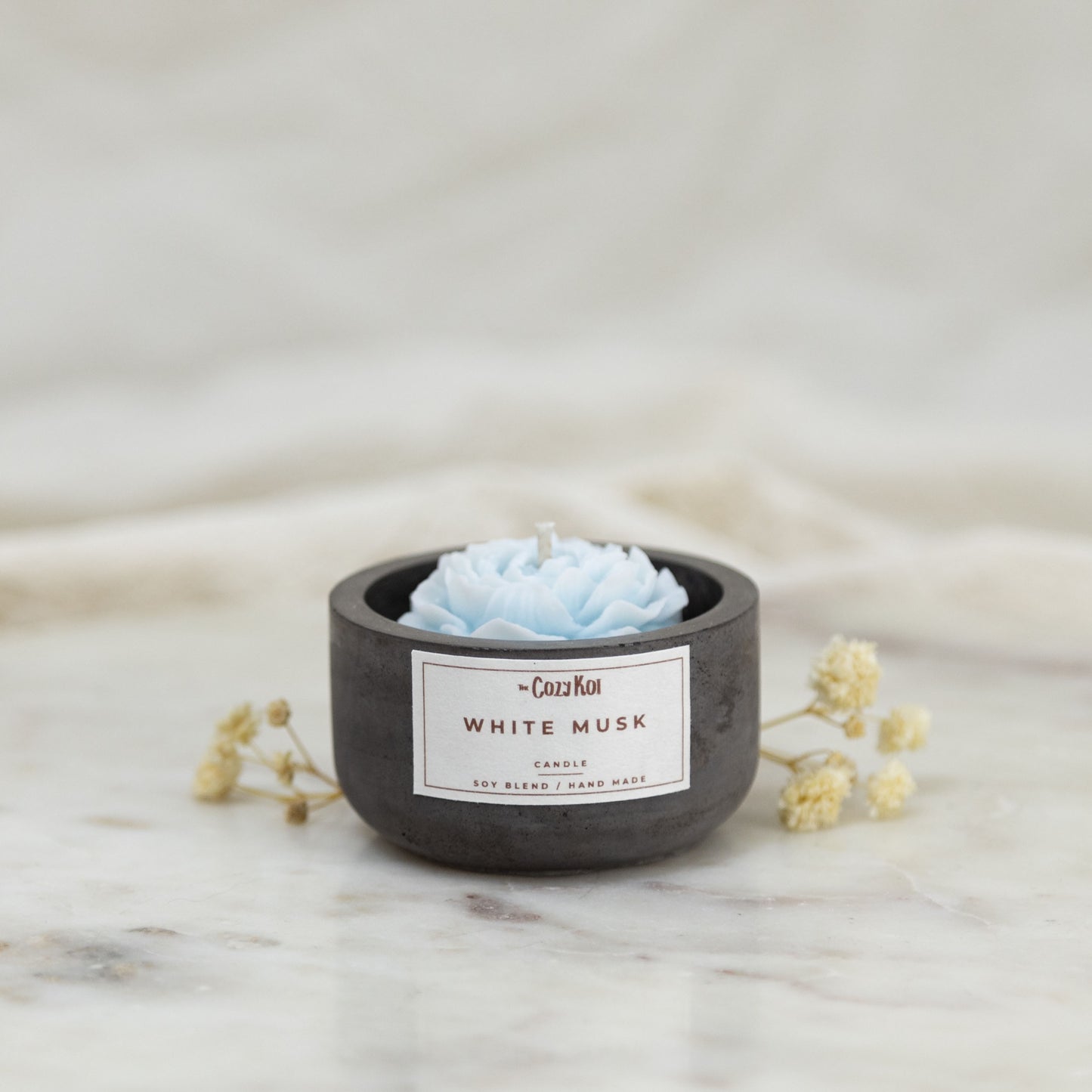 Flowers in Charcoal Pottles