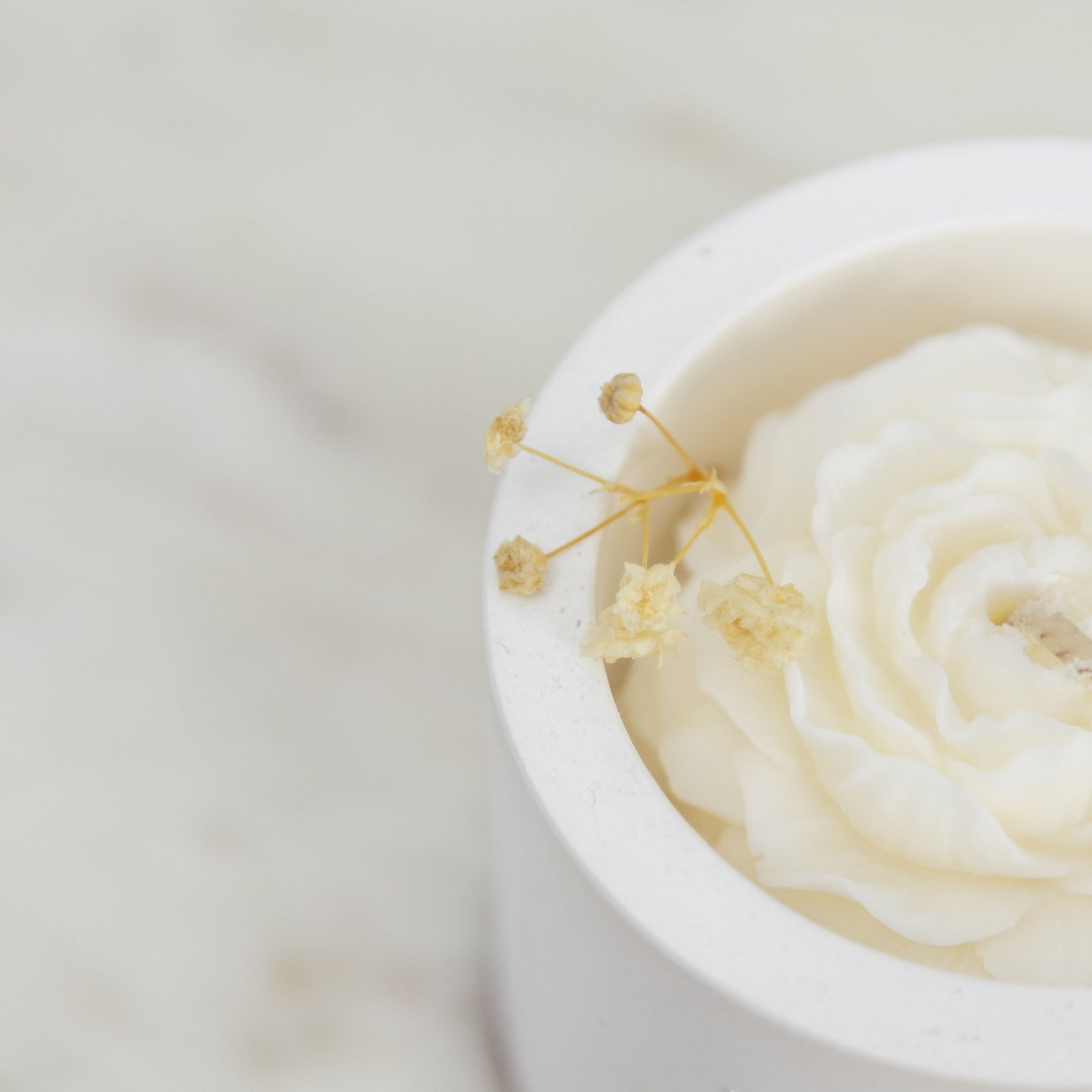 Flowers in Ivory Vessel