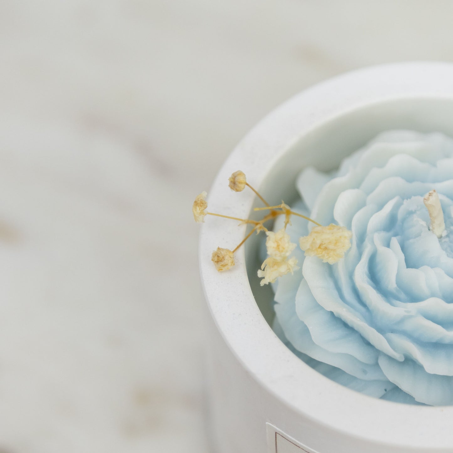 Flowers in Ivory Vessel