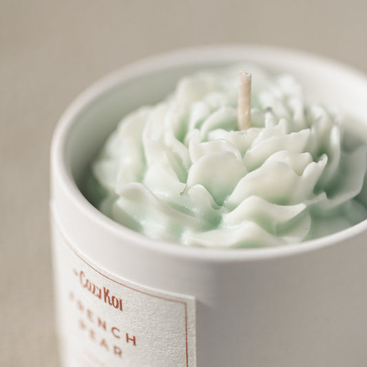Rose Candle in Ivory Vessel